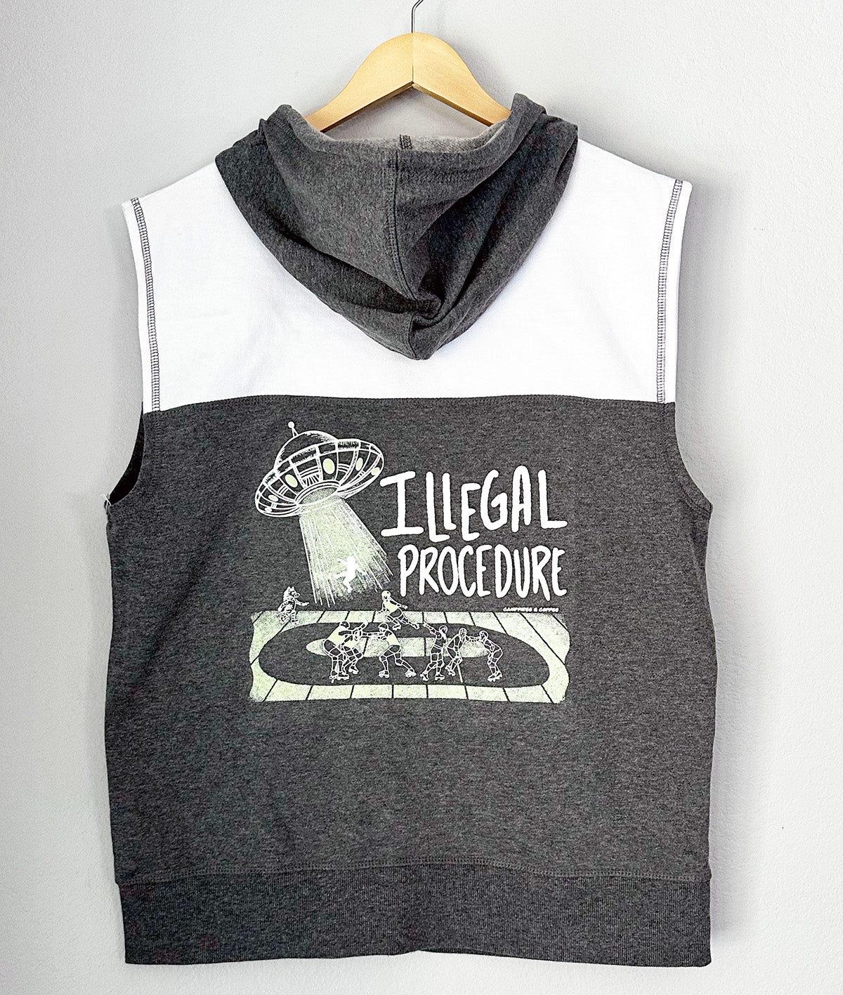 back of grey and white sleeveless zip up hoodie with Illegal Procedure graphic